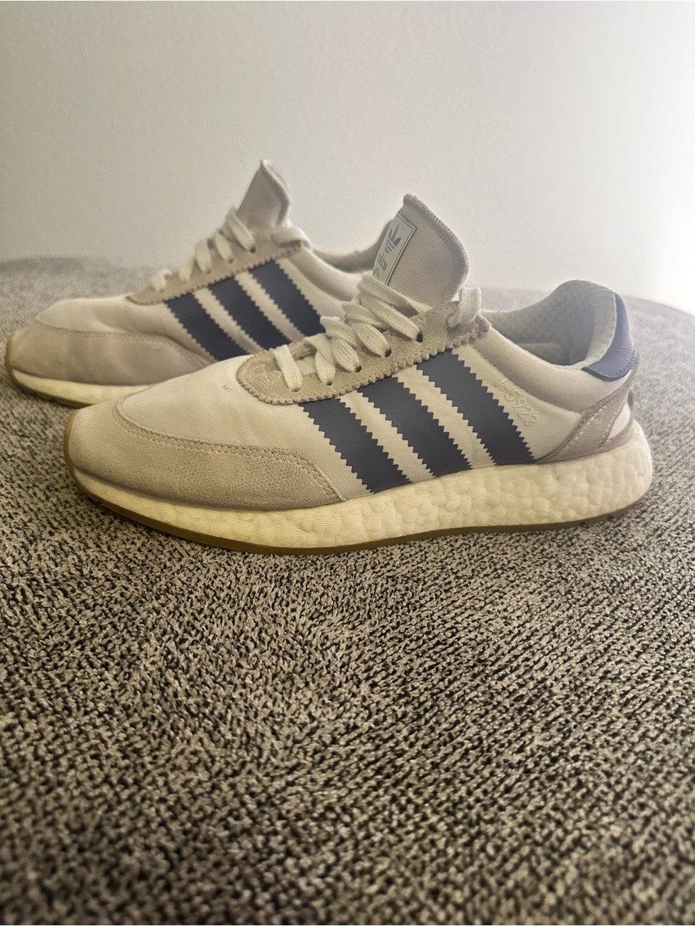 Adidas I-5923 athletic running shoes.